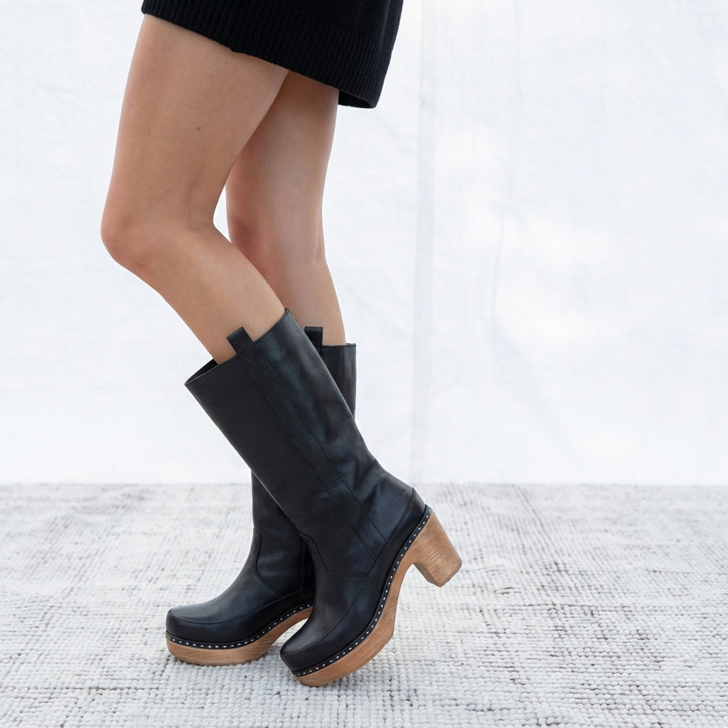 Calou Bea Black leather knee-high clog boots with flex-sole on model