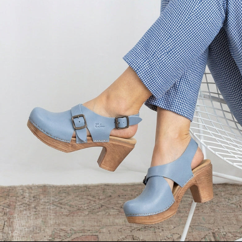 Calou blue buckled slingback clogs on cushioned flexible clogs, lifestyle