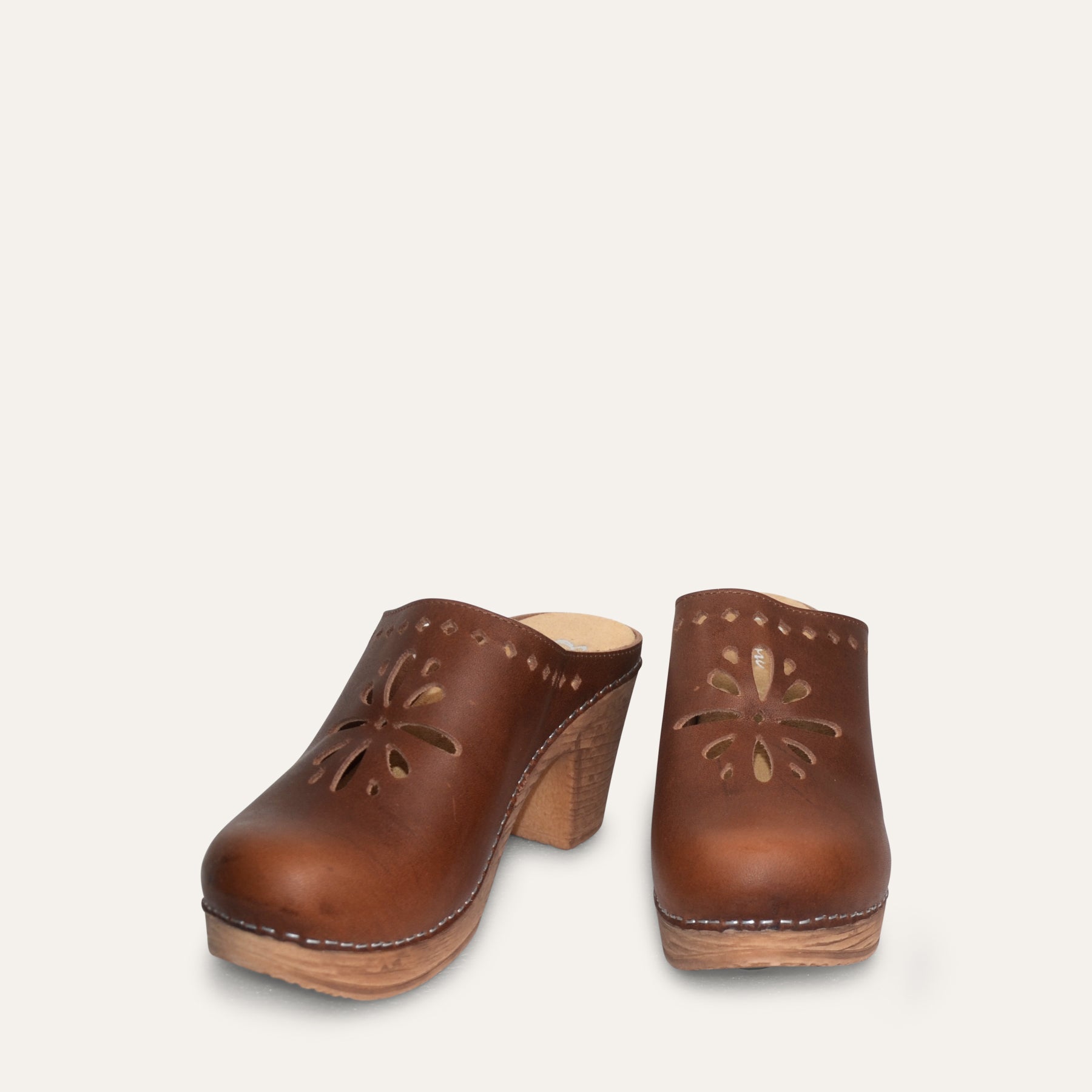 Calou pair of Lottie brown clogs on flexible soles, front