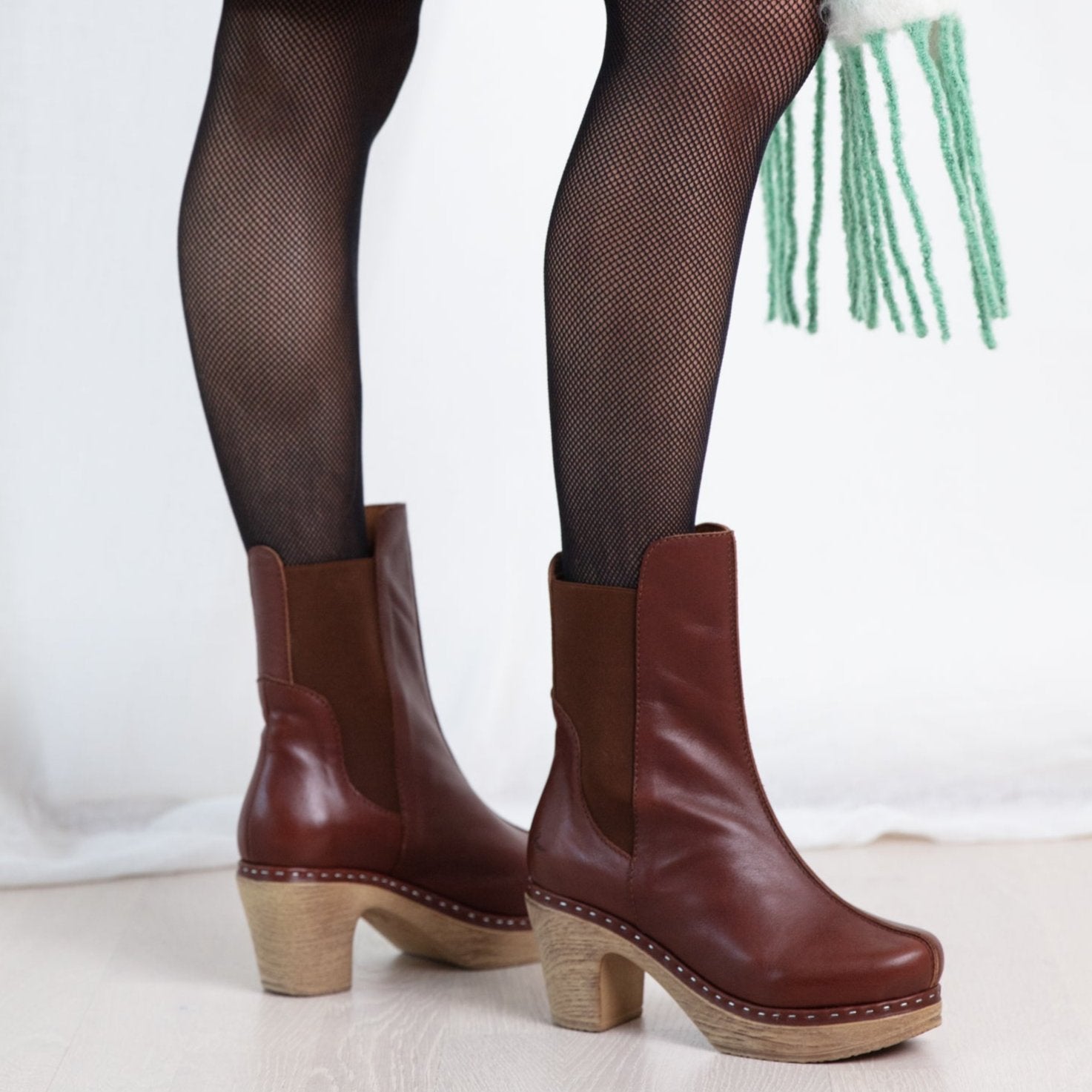 Leia cognac leather clog boot on model Calou