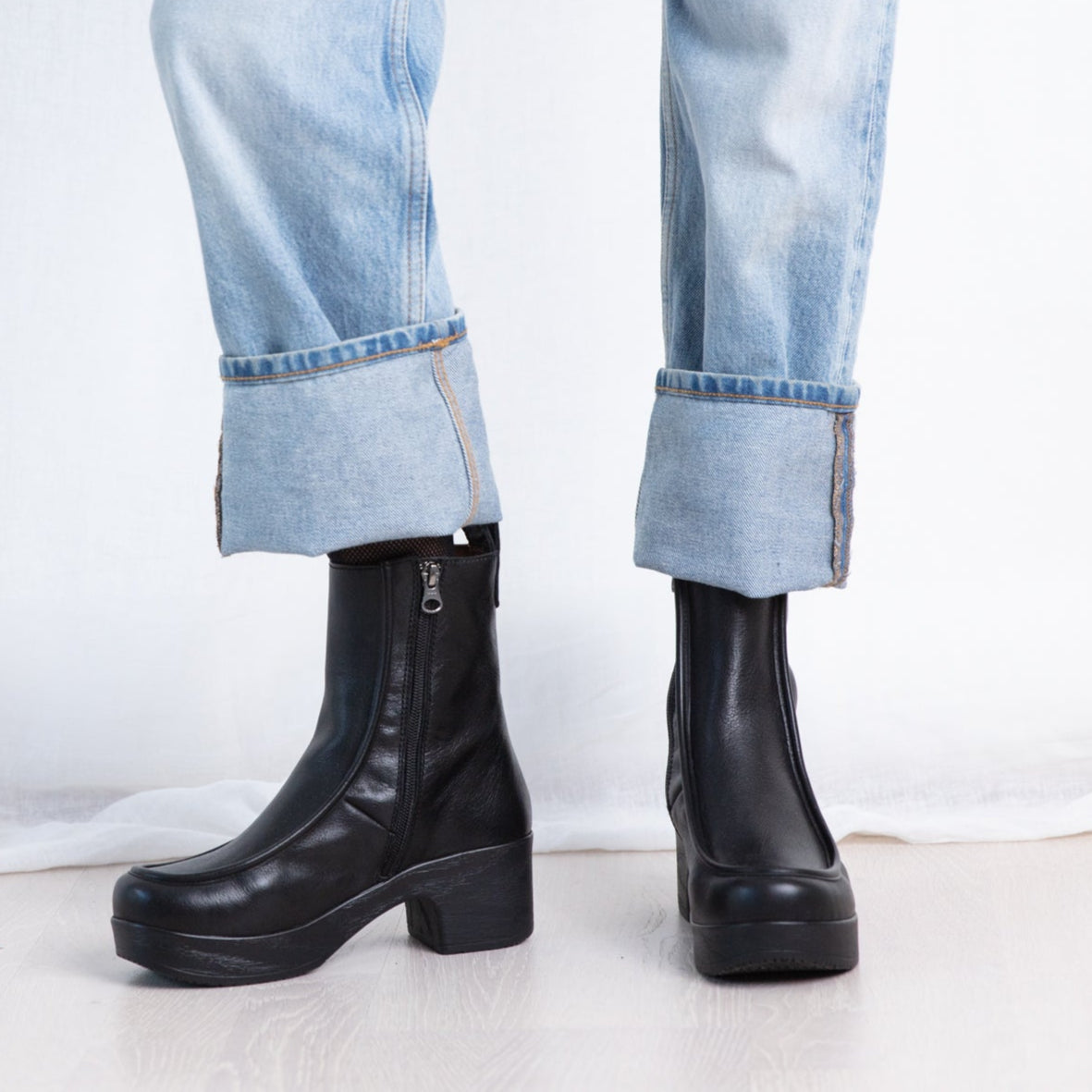 Viola black leather clog boot on model, Calou Stockholm