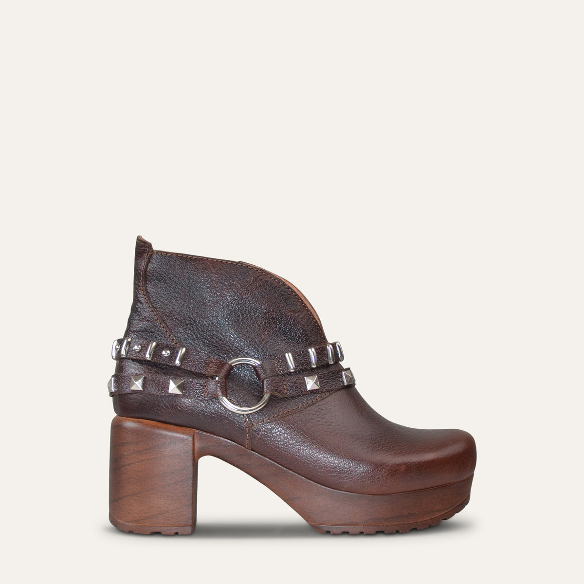 Calou Marita studded harness clog ankle boot in brown leather with wooden heel, side view