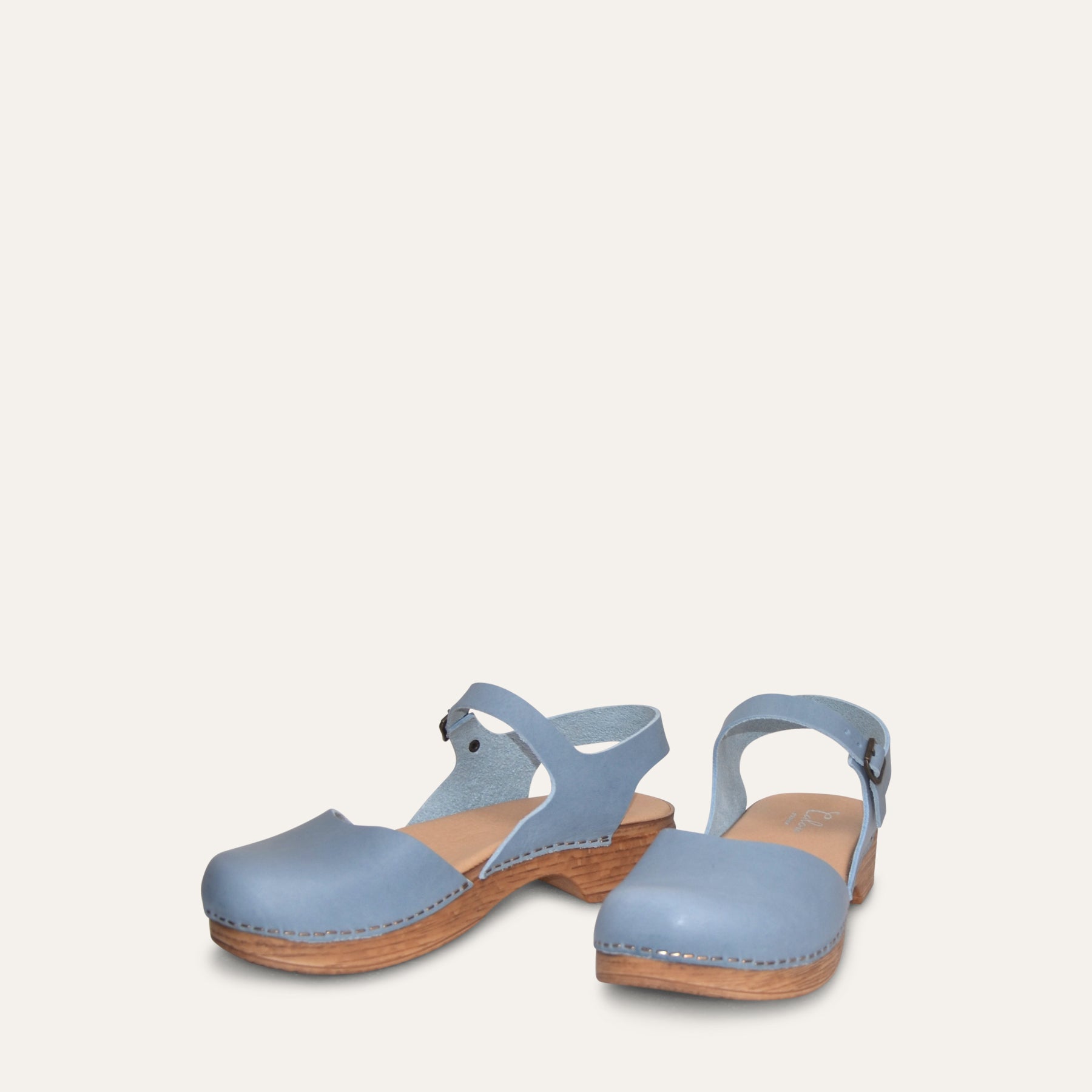 Calou Diana pair of Mary Jane womens clogs on soft flexible soles frontview