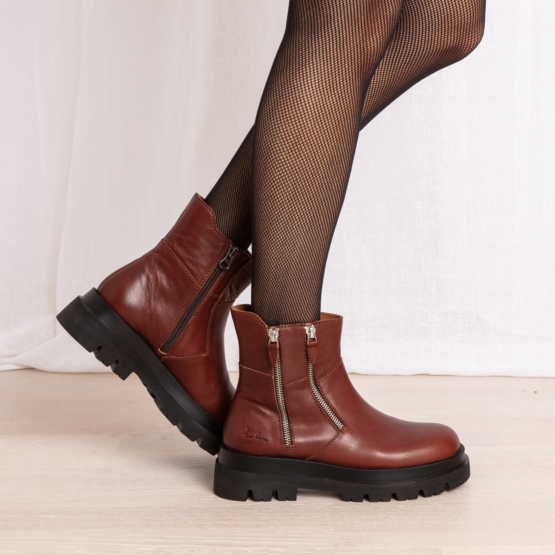 Emma cognac leather boots on model Calou