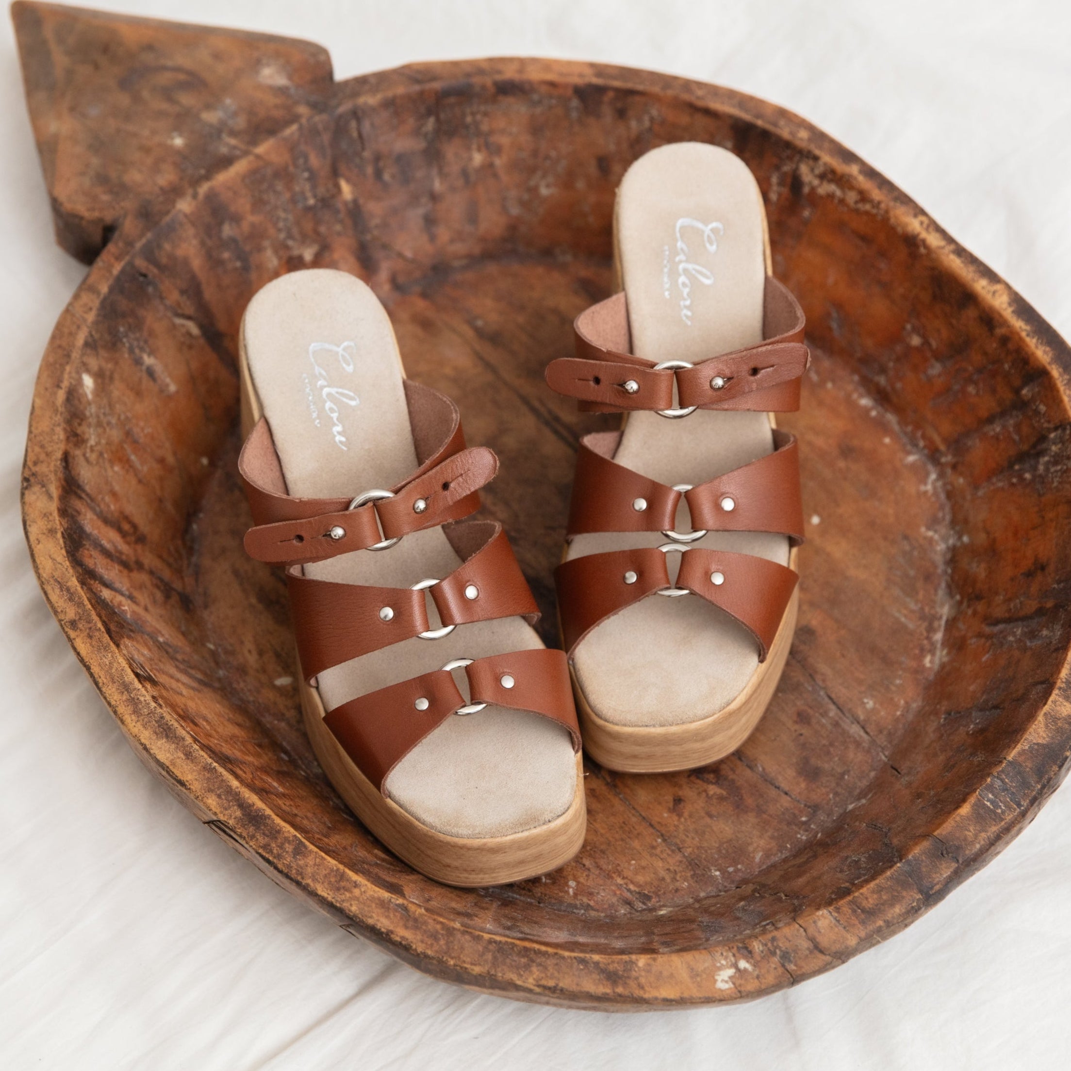 Jenny brown leather clog sandals on woodentray Calou