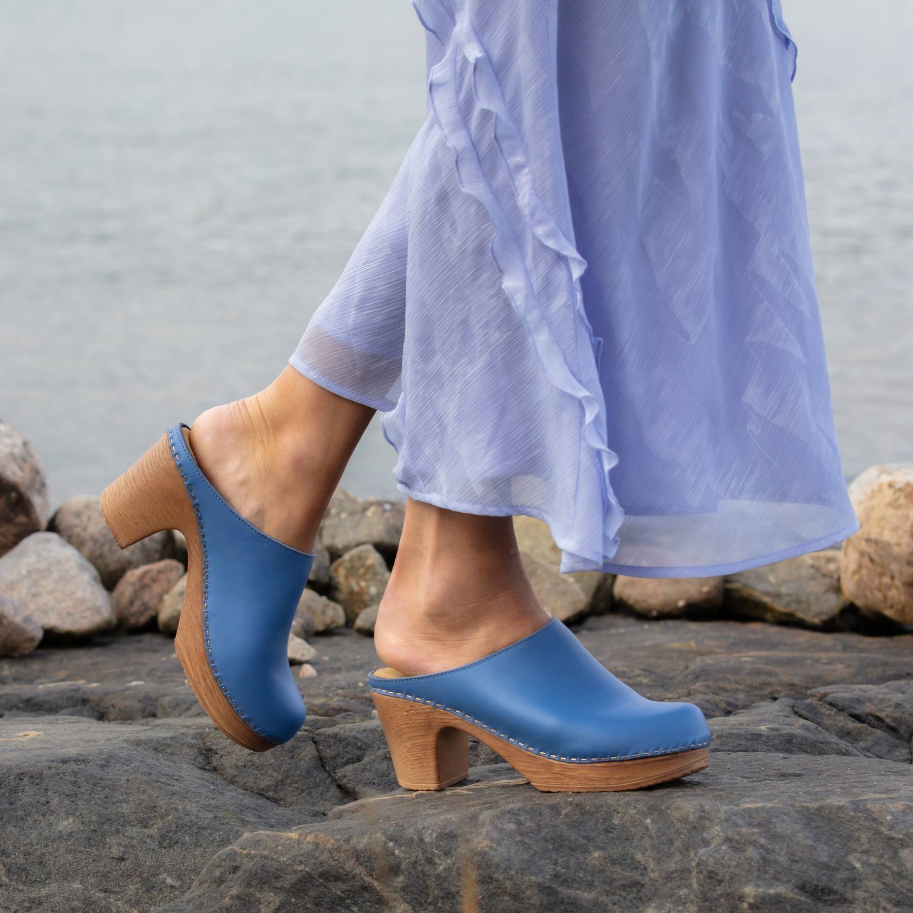 Lisa blue clogs on model