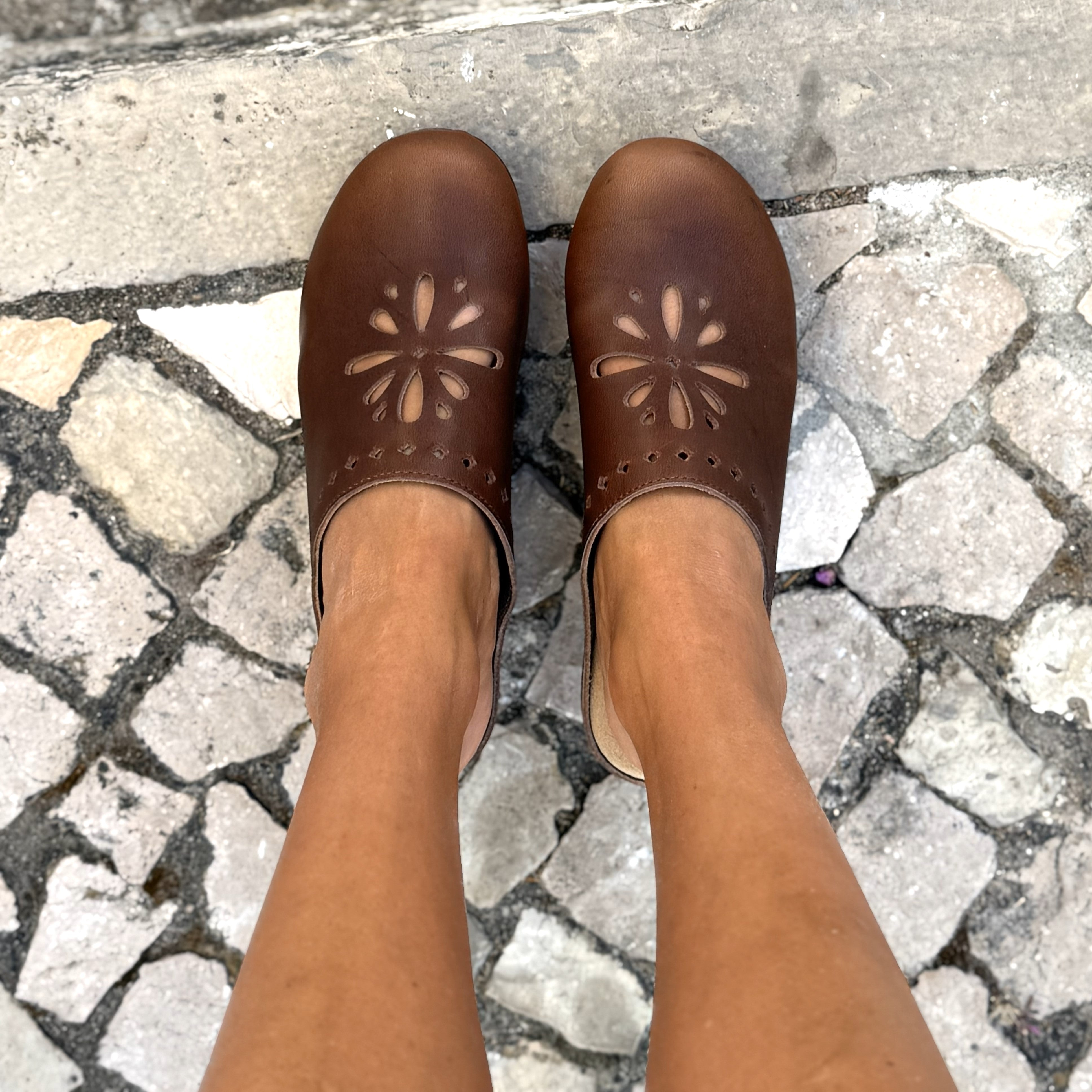 Calou Lottie brown clogs with flower cut-out design on flexible soles