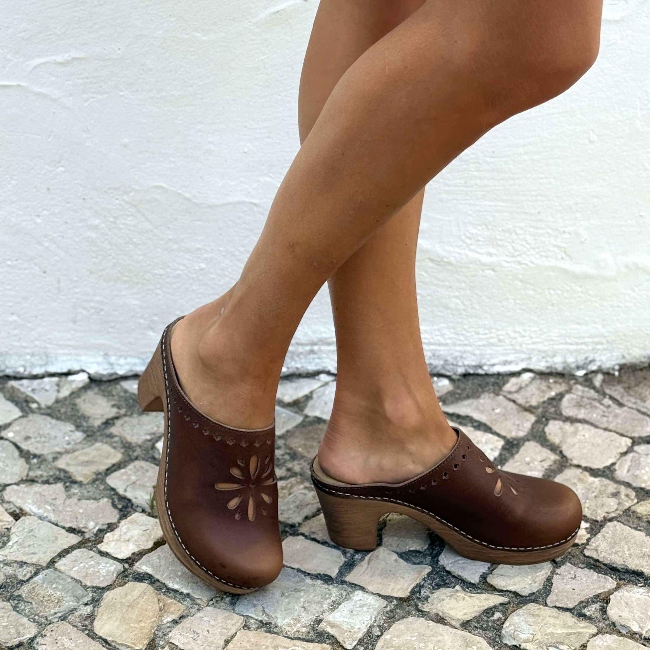 Calou Lottie brown clogs with floral cut-out detail, lifestyle