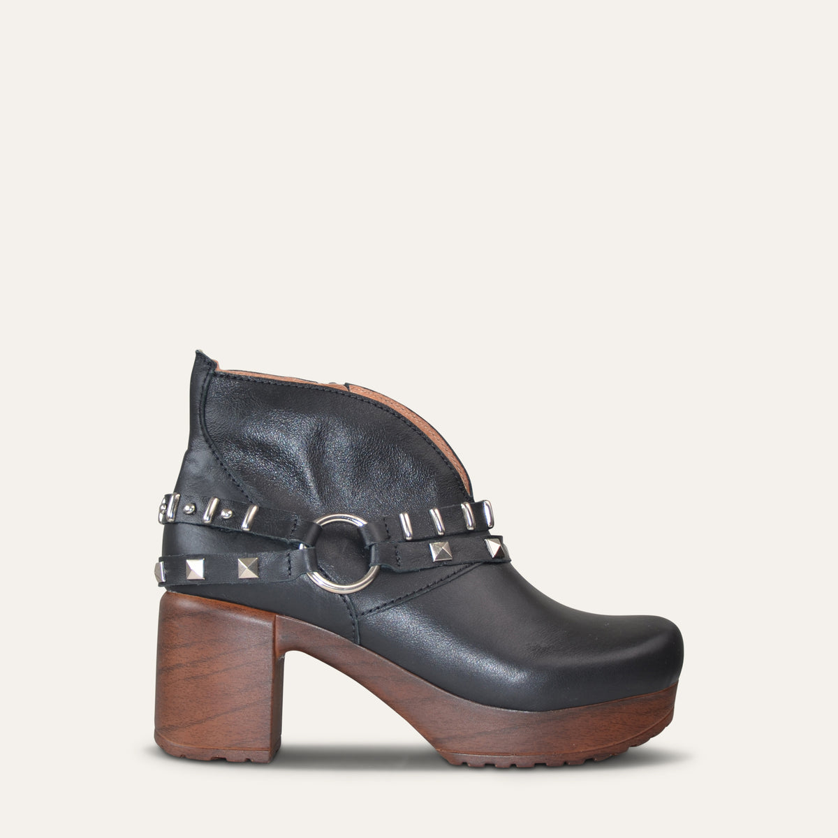 Calou Marita studded harness clog ankle boot in black leather with wooden heel, side view