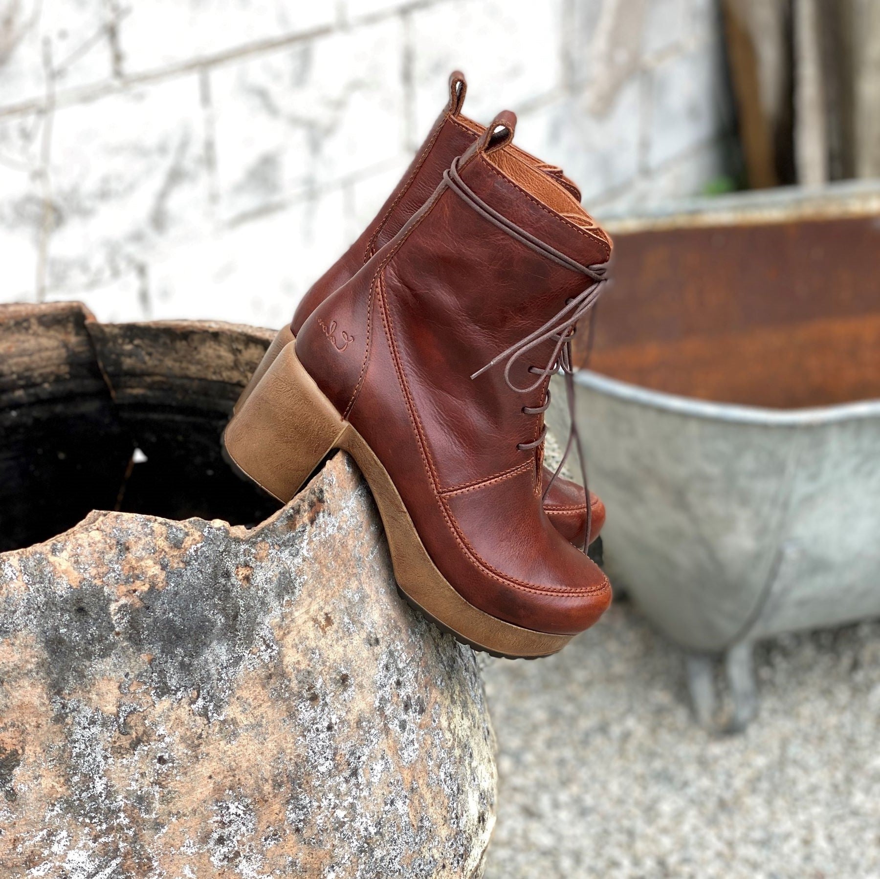 Greta brown leather lace-up clog boot on sida calou stockholm